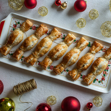 Caramelos de hojaldre, dátil, queso y nuez, una receta de aperitivo para picar esta Navidad