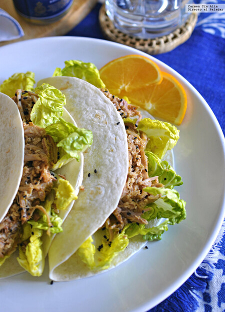 Paletilla de cerdo asada con salsa de naranja y mango